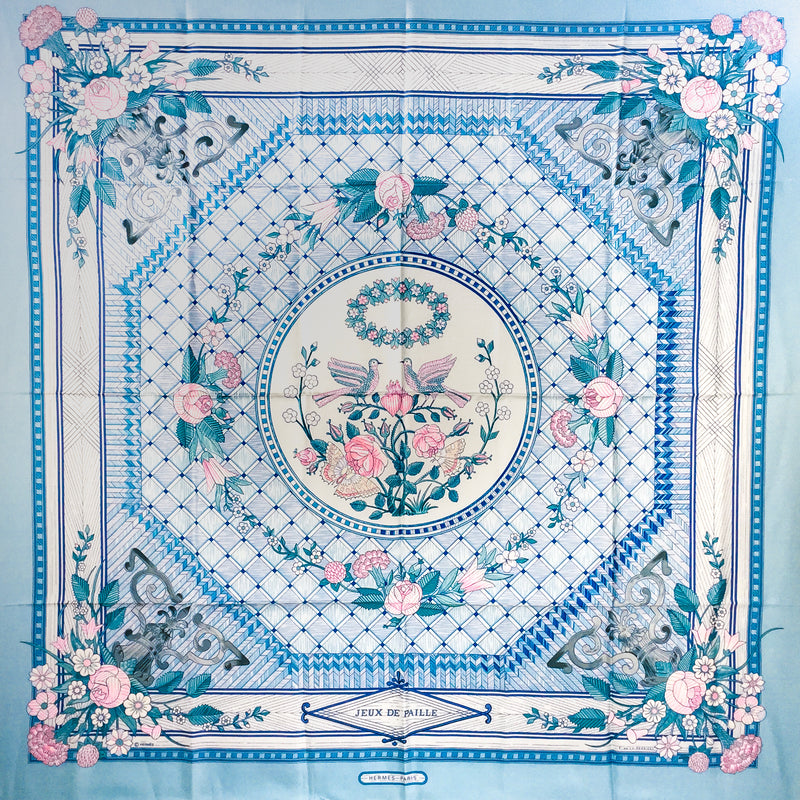 Jeux de Paille Hermes silk scarf by Françoise de la Perriere was first issued in 1984. 