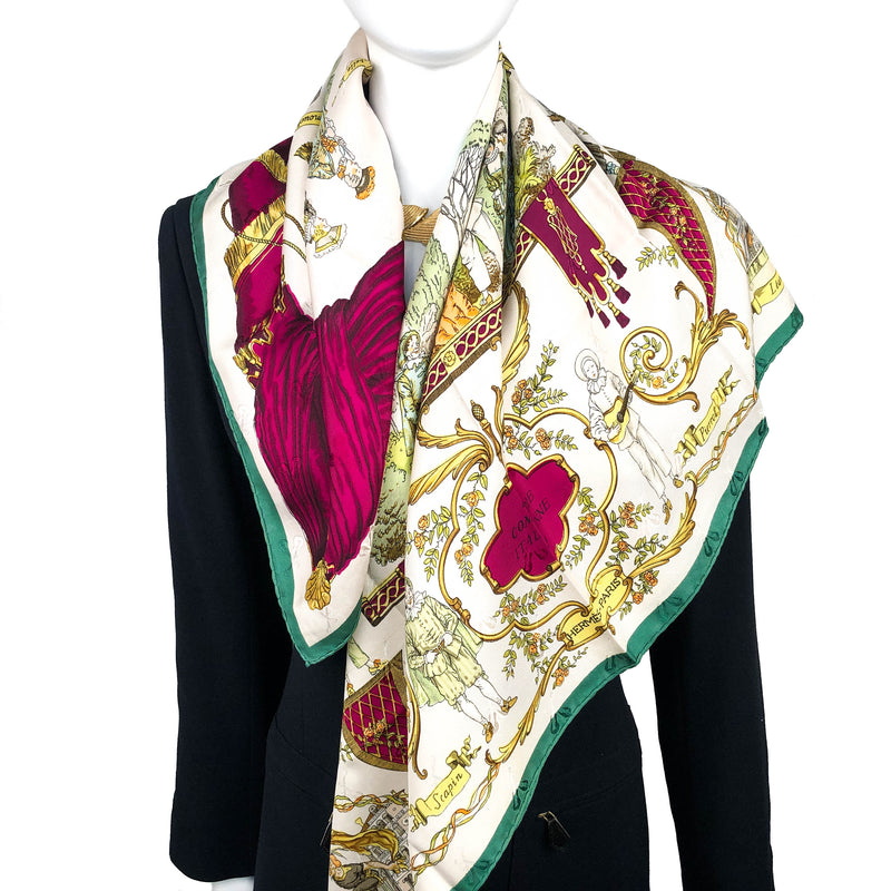 La Comedie Italienne Hermes silk scarf over a black jacket