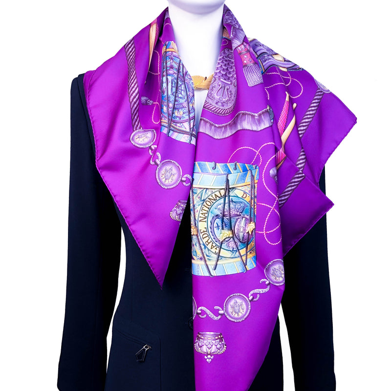 Les Tambours Hermes silk twill scarf worn over black blazer