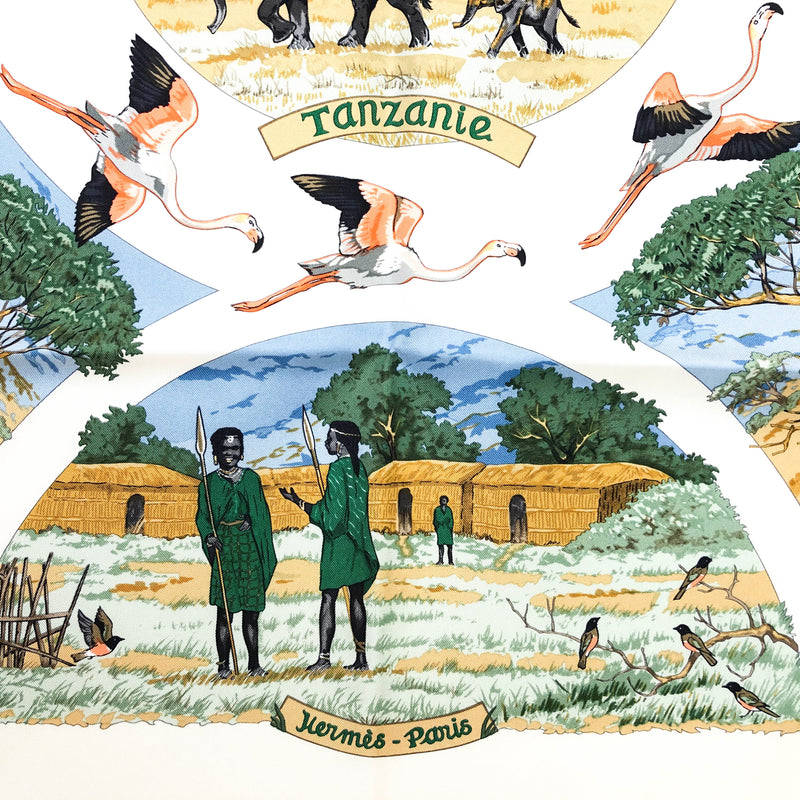 Tanzanie Herme scarf with several vignettes depicting African fauna, flora and native peoples